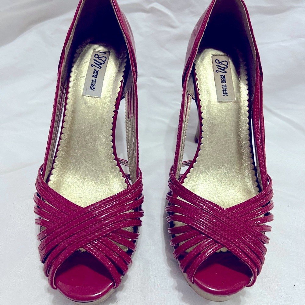 Patent leather peep toe heels only worn once in excellent condition.